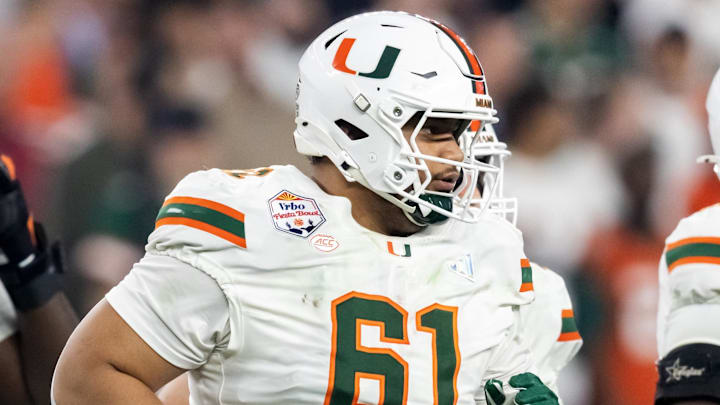 Miami Hurricanes offensive lineman Francis Mauigoa (61) against the Mississippi Rebels during the 2026 Fiesta Bowl and semifinal game of the College Football Playoff at State Farm Stadium. 