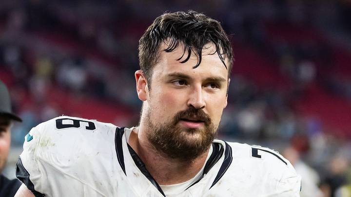 Nov 23, 2025; Glendale, Arizona, USA; Jacksonville Jaguars offensive lineman Ezra Cleveland (76) against the Arizona Cardinals at State Farm Stadium. 