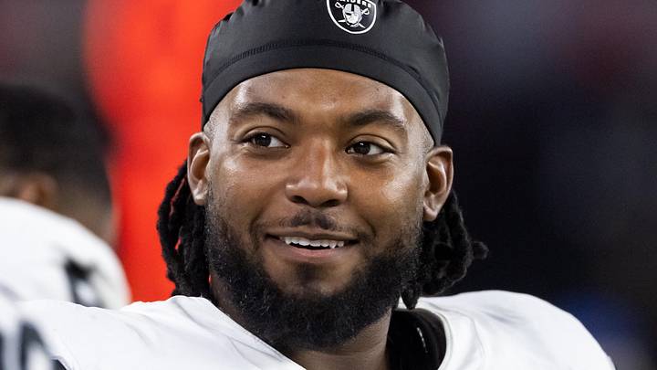 Aug 23, 2025; Glendale, Arizona, USA; Las Vegas Raiders defensive tackle Adam Butler (69) against the Arizona Cardinals during a preseason NFL game at State Farm Stadium. Mandatory Credit: Mark J. Rebilas-Imagn Images