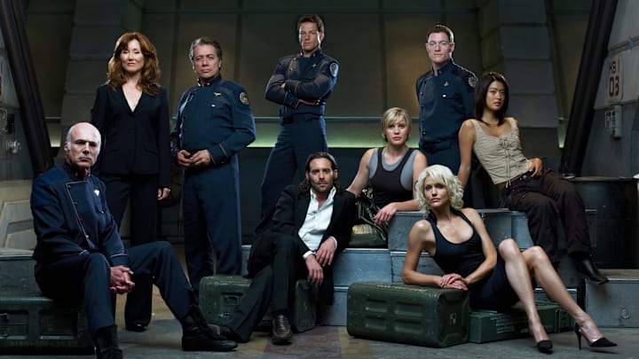 BATTLESTAR GALACTICA -- Season 3 -- Pictured: (l-r) Michael Hogan as Colonel Saul Tigh, Mary McDonnell as President Laura Roslin, Edward James Olmos as Admiral William Adama, Jamie Bamber as Captain Lee "Apollo" Adama, James Callis as Dr. Gaius Baltar, Kattee Sackhoff as Lt. Kara "Starbuck" Thrace, Tahmoh Penikett as Captain Karl "Helo" Agathon, Grace Park as Number Eight, Tricia Helfer as Number Six -- (Photo by: Justin Stephens/Syfy/NBCU Photo Bank)