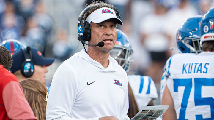 Ole Miss head coach Lane Kiffin worked the sidelines as the Kentucky Wildcats faced off against the Ole Miss Rebels at Kroger Field in Lexington, Kentucky.