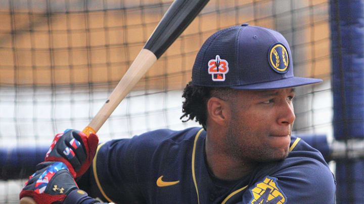 Milwaukee Brewers prospect Jackson Chourio takes batting practice during minor league workouts at