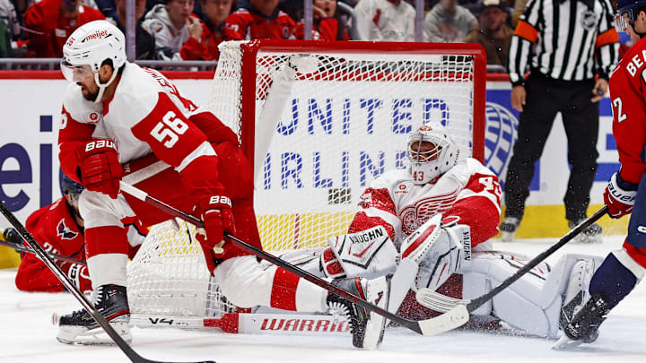 Mar 18, 2025; Washington, District of Columbia, USA; Detroit Red Wings left wing Carter Mazur (43) makes a save during the first period against the Washington Capitals at Capital One Arena. Mandatory Credit: Peter Casey-Imagn Images
