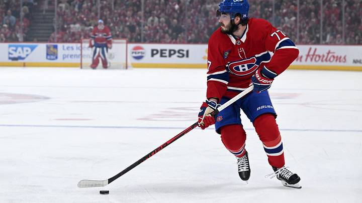 May 27, 2026; Montreal, Quebec, CAN; Montreal Canadiens center Kirby Dach (77) skates with the puck against the Carolina Hurricanes during the first period in game four of the Eastern Conference Final of the 2026 Stanley Cup Playoffs at Bell Centre. Mandatory Credit: David Kirouac-Imagn Images
