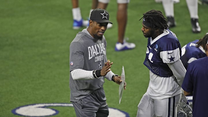 Dallas Cowboys player Trevon Diggs talks with Al Harris during training camp at Ford Center.