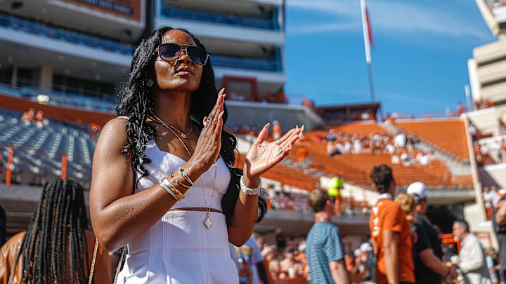 Loreal Sarkisian, wife of Texas head coach Steve Sarkisian, watches the team warm up before the game against Texas Tech.