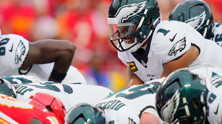 Sep 14, 2025; Kansas City, Missouri, USA; Philadelphia Eagles quarterback Jalen Hurts (1) calls a play at the line of scrimmage against the Kansas City Chiefs during the fourth quarter of the game at GEHA Field at Arrowhead Stadium. Mandatory Credit: Jay Biggerstaff-Imagn Images