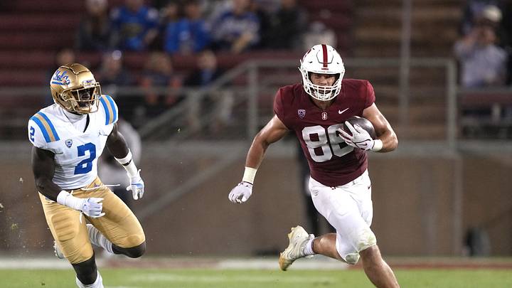 Sam Roush tries to outrun UCLA's Oluwafemi Oladejo. Roush's selection in Round 3 can be a Bears offensive key.