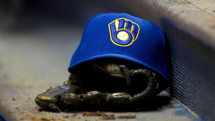 June 10, 2011; Milwaukee, WI, USA; A Milwaukee Brewers hat and glove during the game against the St. Louis Cardinals at Miller Park. The Brewers defeated the Cardinals 8-0. Mandatory Credit: Jeff Hanisch-Imagn Images June 10, 2011; Milwaukee, WI, USA; A Milwaukee Brewers hat and glove during the game against the St. Louis Cardinals at Miller Park. The Brewers defeated the Cardinals 8-0. Mandatory Credit: Jeff Hanisch-Imagn Images