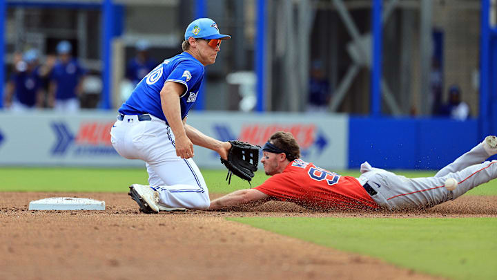 Mar 2, 2026; Dunedin, Florida, USA;  Boston Red Sox center fielder Braiden Ward (92) slides safe into second base as he steals and Toronto Blue Jays shortstop Josh Kasevich (86) attempted to tag him out during the third inning at TD Ballpark. Mandatory Credit: Kim Klement Neitzel-Imagn Images
