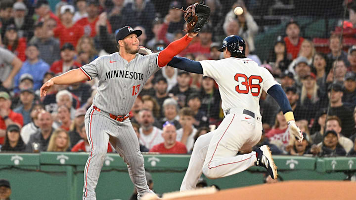 May 2, 2025; Boston, Massachusetts, USA; Boston Red Sox first baseman Triston Casas (36) runs to first base  against Minnesota Twins first baseman Ty France (13) during the second inning at Fenway Park. Mandatory Credit: Eric Canha-Imagn Images