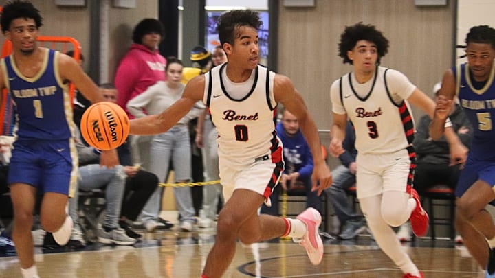 Blake Fagbemi of Benet Academy leads a break in a quarterfinal game at the 93rd Pontiac Holiday Tournament.