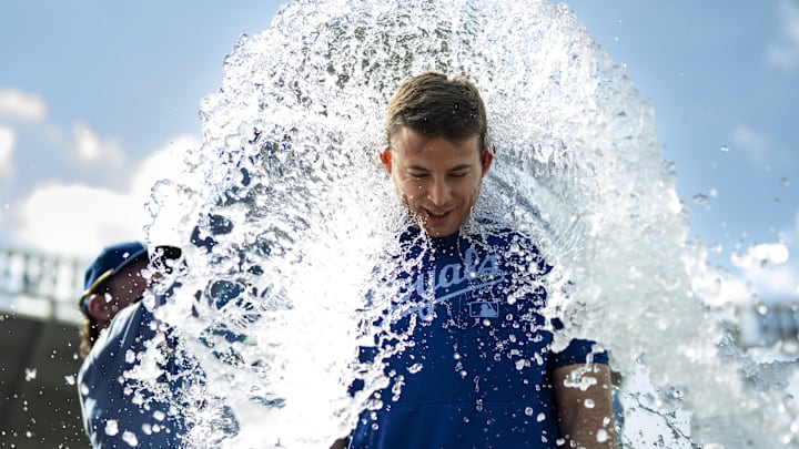 May 8, 2025; Kansas City, Missouri, USA; Kansas City Royals starting pitcher Kris Bubic (50) is doused by shortstop Bobby Witt Jr. (7) after defeating the Chicago White Sox at Kauffman Stadium. Mandatory Credit: Jay Biggerstaff-Imagn Images