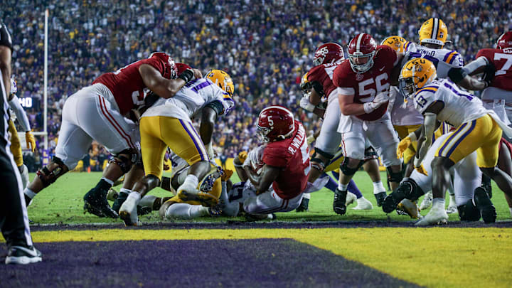 Nov 5, 2022; Baton Rouge, Louisiana, USA; Alabama Crimson Tide running back Roydell Williams (5) rushes in for a touchdown against LSU Tigers safety Joe Foucha (13) during the second half at Tiger Stadium. Mandatory Credit: Stephen Lew-Imagn Images Nov 5, 2022; Baton Rouge, Louisiana, USA; Alabama Crimson Tide running back Roydell Williams (5) rushes in for a touchdown against LSU Tigers safety Joe Foucha (13) during the second half at Tiger Stadium. Mandatory Credit: Stephen Lew-Imagn Images
