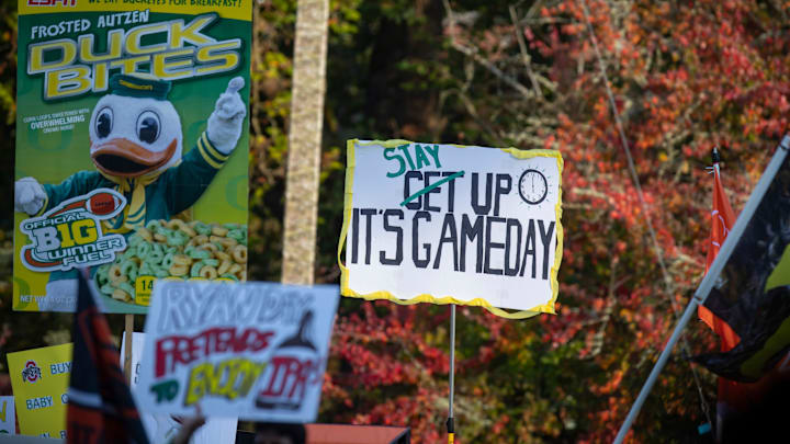 Signs during ESPN’s “College GameDay” Saturday, Oct. 12, 2024 on the campus of the University of Oregon in Eugene, Ore.