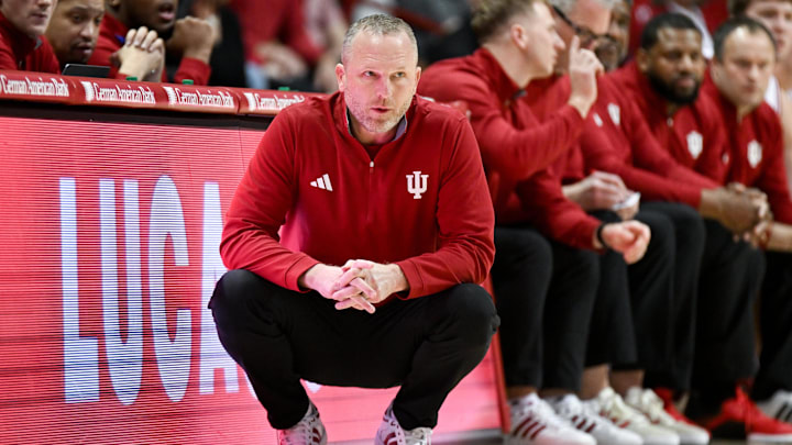 Dec 22, 2025; Bloomington, Indiana, USA; Indiana Hoosiers head coach Darian Devries looks on during the first half against the Siena Saints at Simon Skjodt Assembly Hall. Mandatory Credit: Robert Goddin-Imagn Images