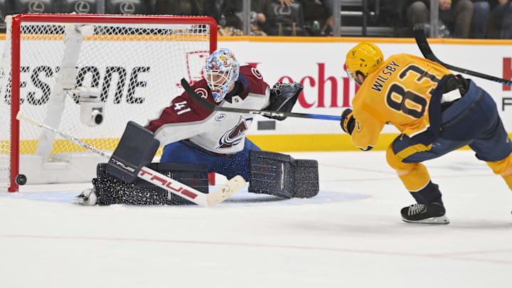 Dec 9, 2025; Nashville, Tennessee, USA; Colorado Avalanche goaltender Scott Wedgewood (41) blocks the shot of Nashville Predators defenseman Adam Wilsby (83) during the overtime period at Bridgestone Arena. Mandatory Credit: Steve Roberts-Imagn Images Dec 9, 2025; Nashville, Tennessee, USA; Colorado Avalanche goaltender Scott Wedgewood (41) blocks the shot of Nashville Predators defenseman Adam Wilsby (83) during the overtime period at Bridgestone Arena. Mandatory Credit: Steve Roberts-Imagn Images