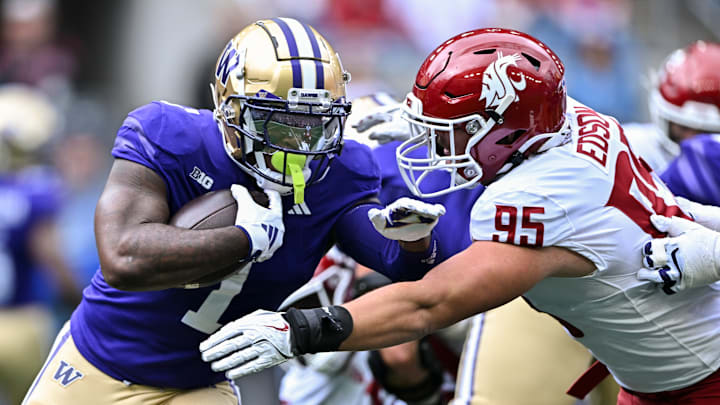 University of Washington running back Jonah Coleman carries the ball against Washington State University in the 2024 Apple Cup on Sept. 14, 2024.