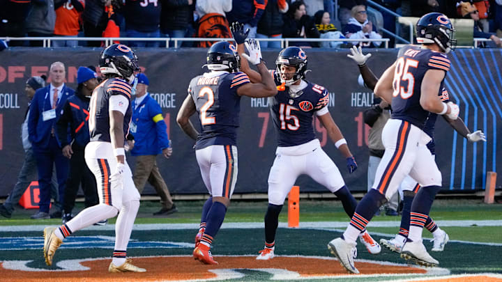 Wide receiver Rome Odunze (15) celebrates with teammates after catching a touchdown against the Pittsburgh Steelers. Wide receiver Rome Odunze (15) celebrates with teammates after catching a touchdown against the Pittsburgh Steelers.