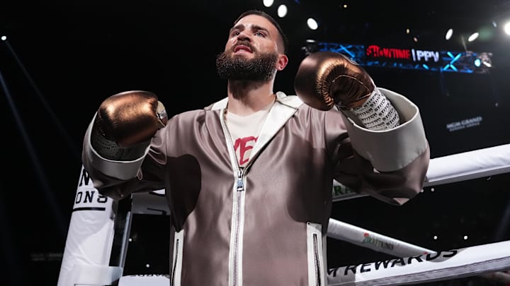 Caleb Plant enters the arena to face David Benavidez in their Interim WBC Super Middleweight Championship boxing bout at MGM Grand Garden Arena. 