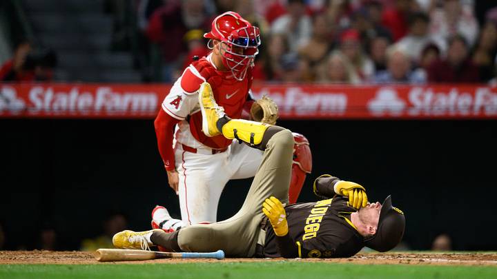 Apr 18, 2026; Anaheim, California, USA; San Diego Padres second baseman Jake Cronenworth (9) reacts after being hit by a pitch during the fifth inning against the Los Angeles Angels at Angel Stadium. Mandatory Credit: William Liang-Imagn Images Apr 18, 2026; Anaheim, California, USA; San Diego Padres second baseman Jake Cronenworth (9) reacts after being hit by a pitch during the fifth inning against the Los Angeles Angels at Angel Stadium. Mandatory Credit: William Liang-Imagn Images