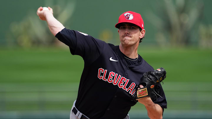 Mar 12, 2024; Surprise, Arizona, USA; Cleveland Guardians starting pitcher Shane Bieber (57) pitches against the Texas Rangers during the first inning at Surprise Stadium.