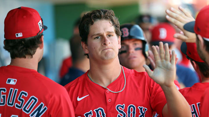 Feb 28, 2025; Clearwater, Florida, USA; Boston Red Sox outfielder Roman Anthony (48) is congratulated after he scored a run against the Philadelphia Phillies during the third inning at BayCare Ballpark. Mandatory Credit: Kim Klement Neitzel-Imagn Images Feb 28, 2025; Clearwater, Florida, USA; Boston Red Sox outfielder Roman Anthony (48) is congratulated after he scored a run against the Philadelphia Phillies during the third inning at BayCare Ballpark. Mandatory Credit: Kim Klement Neitzel-Imagn Images