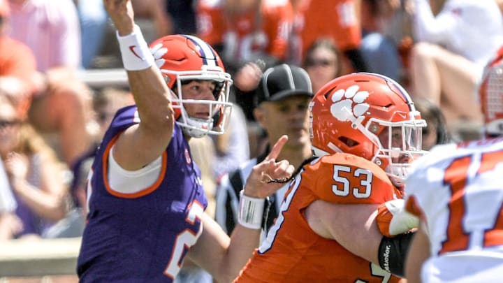 Clemson quarterback Cade Klubnik (2) passes near the blocking from Clemson offensive lineman Ryan Linthicum (53)