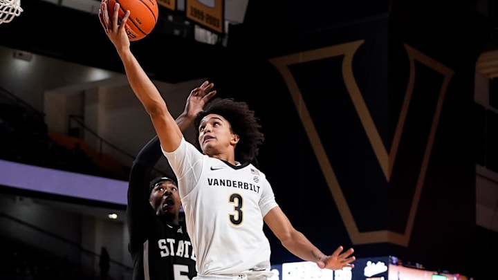 Vanderbilt guard Tyler Tanner (3) shoots for two past Mississippi State guard Shawn Jones Jr. (5) during the second half at Memorial Gymnasium in Nashville, Tenn., Tuesday, Jan. 7, 2025.