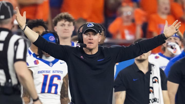 Dec 31, 2024; Glendale, AZ, USA; Boise State Broncos head coach Spencer Danielson reacts against the Penn State Nittany Lions during the Fiesta Bowl at State Farm Stadium. 