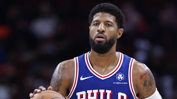 Dec 8, 2024; Chicago, Illinois, USA; Philadelphia 76ers forward Paul George (8) brings the ball up court against the Chicago Bulls during the second half at United Center. Mandatory Credit: Kamil Krzaczynski-Imagn Images