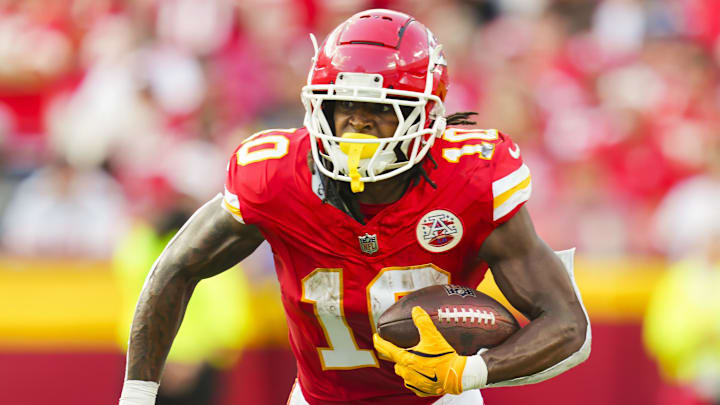 Sep 15, 2024; Kansas City, Missouri, USA; Kansas City Chiefs running back Isiah Pacheco (10) runs the ball during the first half against the Cincinnati Bengals at GEHA Field at Arrowhead Stadium. Mandatory Credit: Jay Biggerstaff-Imagn Images