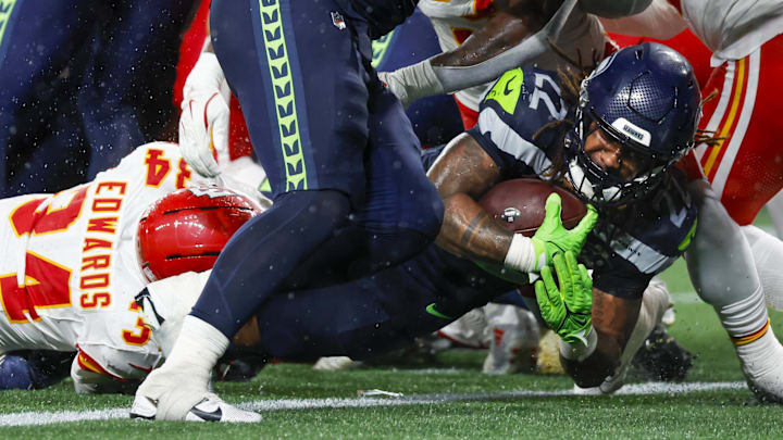 Aug 15, 2025; Seattle, Washington, USA; Seattle Seahawks running back Damien Martinez (22) rushes for a touchdown against the Kansas City Chiefs during the third quarter at Lumen Field.