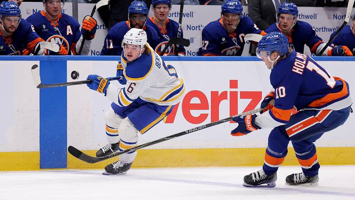 Jan 24, 2026; Elmont, New York, USA; Buffalo Sabres left wing Zach Benson (6) and New York Islanders right wing Simon Holmstrom (10) fight for the puck during the first period at UBS Arena. Mandatory Credit: Brad Penner-Imagn Images Jan 24, 2026; Elmont, New York, USA; Buffalo Sabres left wing Zach Benson (6) and New York Islanders right wing Simon Holmstrom (10) fight for the puck during the first period at UBS Arena. Mandatory Credit: Brad Penner-Imagn Images