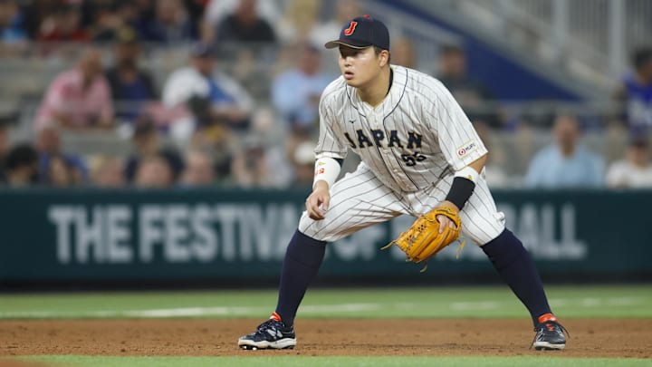 Mar 21, 2023; Miami, Florida, USA; Japan third baseman Munetaka Murakami (55) plays his position during the sixth inning against the USA at LoanDepot Park. Mandatory Credit: Sam Navarro-Imagn Images