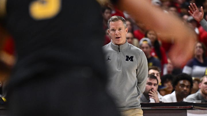 Dec 13, 2025; College Park, Maryland, USA; Michigan Wolverines head coach Dusty May watches his team play against the Maryland Terrapins in the second half at Xfinity Center. Mandatory Credit: Jamie Sabau-Imagn Images Dec 13, 2025; College Park, Maryland, USA; Michigan Wolverines head coach Dusty May watches his team play against the Maryland Terrapins in the second half at Xfinity Center. Mandatory Credit: Jamie Sabau-Imagn Images