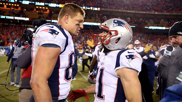 Jan 20, 2019; Kansas City, MO, USA; New England Patriots wide receiver Julian Edelman (11) celebrates with tight end Rob Gronkowski (87) after defeating the Kansas City Chiefs in overtime of the AFC Championship game at Arrowhead Stadium. Mandatory Credit: Mark J. Rebilas-Imagn Images