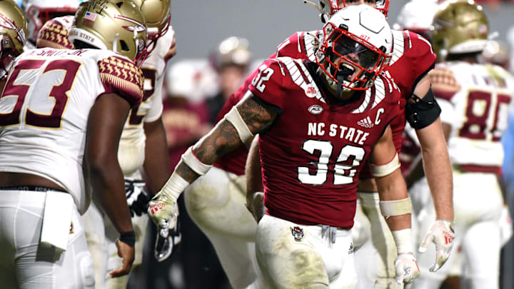 North Carolina State Wolfpack linebacker Drake Thomas (32) reacts to a defensive stop
