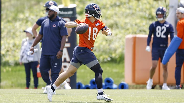 May 23, 2024; Lake Forest, IL, USA; Chicago Bears quarterback Caleb Williams (18) throws the ball during organized team activities at Halas Hall Mandatory Credit: Kamil Krzaczynski-USA TODAY Sports