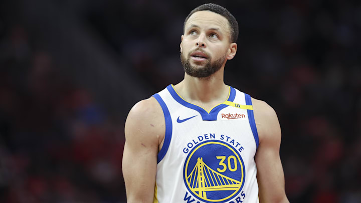 Golden State Warriors guard Stephen Curry (30) looks up after a play during the fourth quarter against the Houston Rockets at Toyota Center.