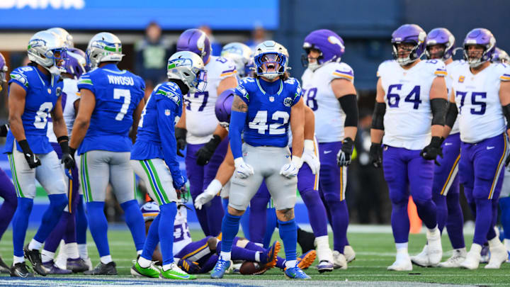 Nov 30, 2025; Seattle, Washington, USA; Seattle Seahawks linebacker Drake Thomas (42) celebrates after a tackle during the second half against the Minnesota Vikings at Lumen Field.