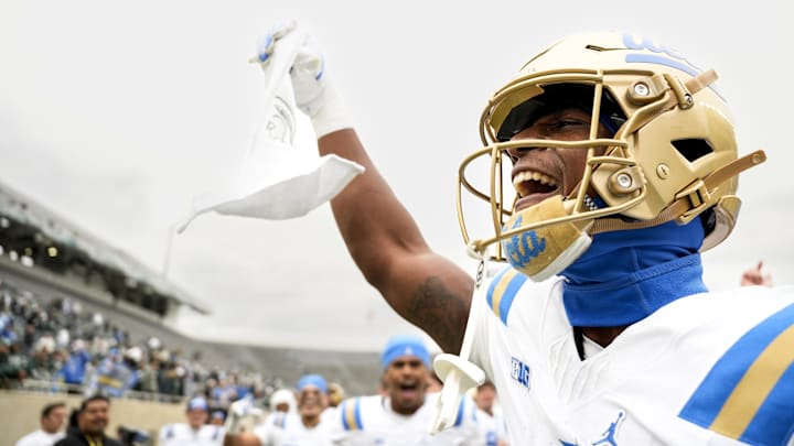 UCLA Bruins defensive back Key Lawrence (4) holds up a towel
