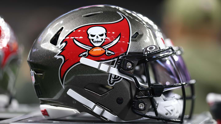 A Tampa Bay Buccaneers helmet is seen on the sidelines prior to a game against the New Orleans Saints 
