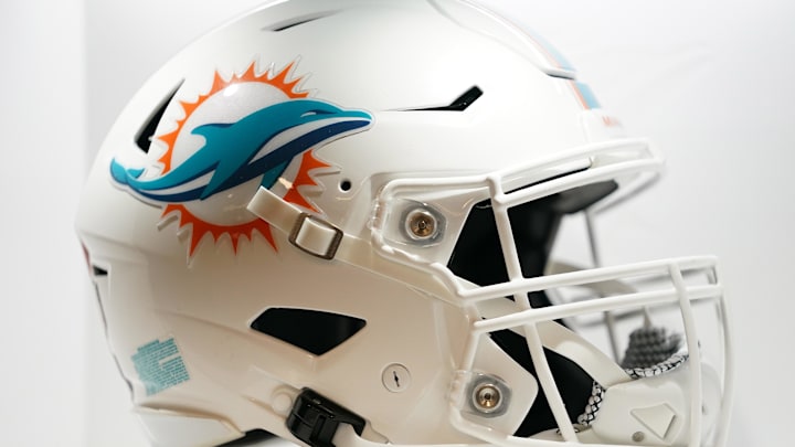 Jul 20, 2021; Miami Gardens, FL, USA; A general view of a Miami Dolphins helmet in the locker room during the grand opening at Baptist Health Training Complex. Mandatory Credit: Jasen Vinlove-Imagn Images Jul 20, 2021; Miami Gardens, FL, USA; A general view of a Miami Dolphins helmet in the locker room during the grand opening at Baptist Health Training Complex. Mandatory Credit: Jasen Vinlove-Imagn Images