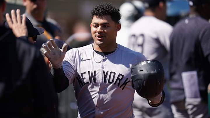 Sep 22, 2024; Oakland, California, USA; New York Yankees left fielder Jasson Dominguez (89) is congratulated by teammates after hitting a two-run home run against the Oakland Athletics in the second inning at the Oakland-Alameda County Coliseum. Mandatory Credit: Cary Edmondson-Imagn Images Sep 22, 2024; Oakland, California, USA; New York Yankees left fielder Jasson Dominguez (89) is congratulated by teammates after hitting a two-run home run against the Oakland Athletics in the second inning at the Oakland-Alameda County Coliseum. Mandatory Credit: Cary Edmondson-Imagn Images