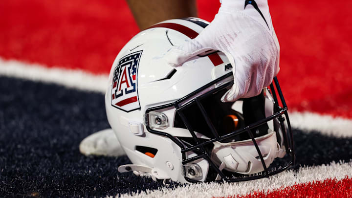 Oct 5, 2024; Tucson, Arizona, USA; Arizona Wildcats helmet gets picked before the game against the Texas Tech Red Raiders at Arizona Stadium. Mandatory Credit: Aryanna Frank-Imagn Images
