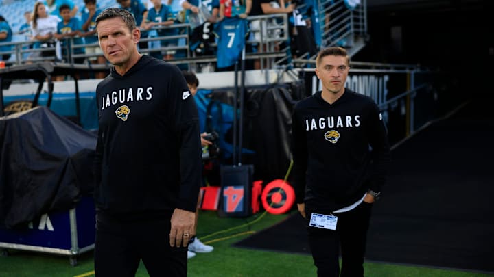 Jacksonville Jaguars Executive Vice President of football operations Tony Boselli, left, and General Manager James Gladstone walks on the field before an NFL football matchup at EverBank Stadium, Monday, Oct. 6, 2025, in Jacksonville, Fla. [Corey Perrine/Florida Times-Union]