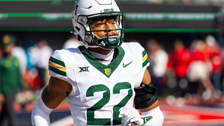 Nov 22, 2025; Tucson, Arizona, USA; Baylor Bears cornerback Reggie Bush II (22) against the Arizona Wildcats at Casino Del Sol Stadium. Mandatory Credit: Mark J. Rebilas-Imagn Images Nov 22, 2025; Tucson, Arizona, USA; Baylor Bears cornerback Reggie Bush II (22) against the Arizona Wildcats at Casino Del Sol Stadium. Mandatory Credit: Mark J. Rebilas-Imagn Images