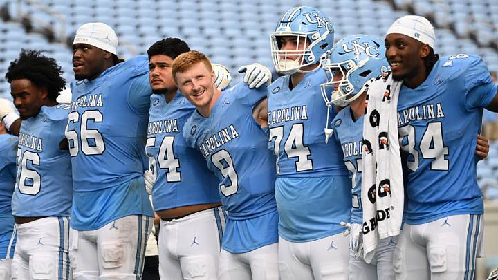 Sep 12, 2026; Chapel Hill, North Carolina, USA; North Carolina Tar Heels players including quarterback Billy Edwards Jr. (9) (center) together after the game at Kenan Stadium. Mandatory Credit: Bob Donnan-Imagn Images Sep 12, 2026; Chapel Hill, North Carolina, USA; North Carolina Tar Heels players including quarterback Billy Edwards Jr. (9) (center) together after the game at Kenan Stadium. Mandatory Credit: Bob Donnan-Imagn Images