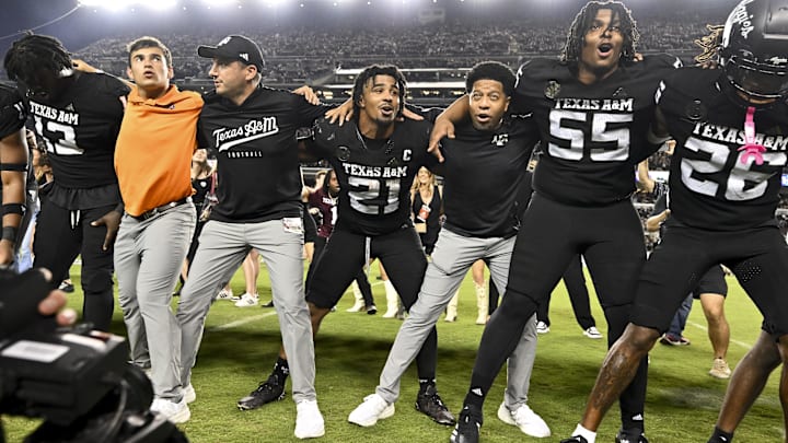 Oct 26, 2024; College Station, Texas, USA; Texas A&M Aggies linebacker Taurean York (21) celebrates with teammates after the win against the LSU Tigers. The Aggies defeated the Tigers 38-23; at Kyle Field. Mandatory Credit: Maria Lysaker-Imagn Images. 